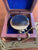 Brass compass with chain in wooden box