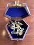 Brass sextant in wooden box