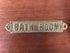 brass name plate; BATHROOM